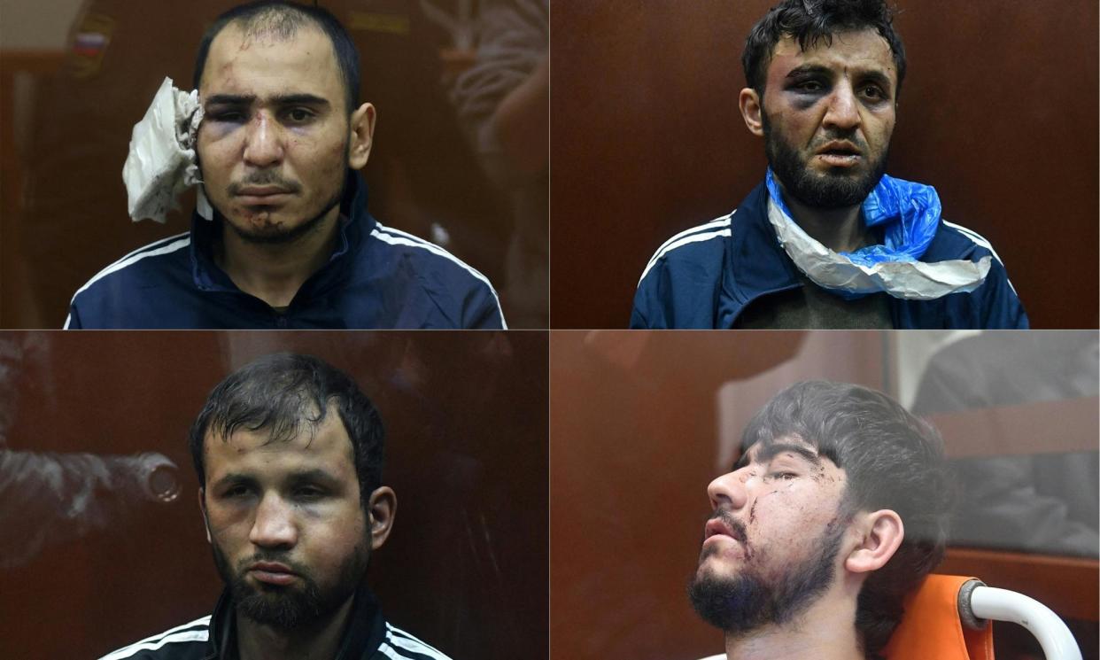 <span>Clockwise from top left, Saidakrami Murodalii Rachabalizoda, Dalerdzhon Mirzoyev, Muhammadsobir Fayzov and Shamsidin Fariduni suspected of taking part in the attack of a concert hall that killed 137 people.</span><span>Photograph: Tatyana Makeyevaolga Maltseva/AFP/Getty Images</span>