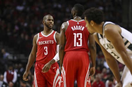 Dec 16, 2017; Houston, TX, USA; Houston Rockets guard Chris Paul (3) talks with guard James Harden (13) during the second quarter against the Milwaukee Bucks at Toyota Center. Mandatory Credit: Troy Taormina-USA TODAY Sports