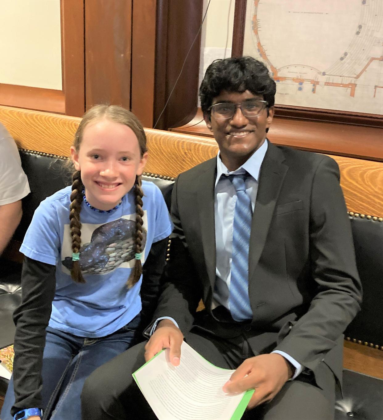 Semona Peet, a fifth-grader from Southborough, left and Sriniketh Velagapudi, a high school student from Andover, are proposing the state adopted the endangered blue spotted salamander as the state amphibian.