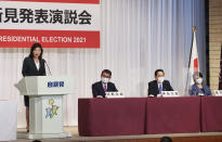 A candidate of the ruling Liberal Democratic Party (LDP) presidential election, Seiko Noda, left, delivers a campaign speech while other candidates Administrative Reform Minister Taro Kono second left, former Foreign Minister Fumio Kishida, second right, and former Internal Affairs Minister Sanae Takaichi listen Friday, Sept. 17, 2021, in Tokyo. The presidential election to choose successor of Prime Minister Yoshihide Suga will be voted on Sept. 29. (Yoshikazu Tsuno/Pool Photo via AP)