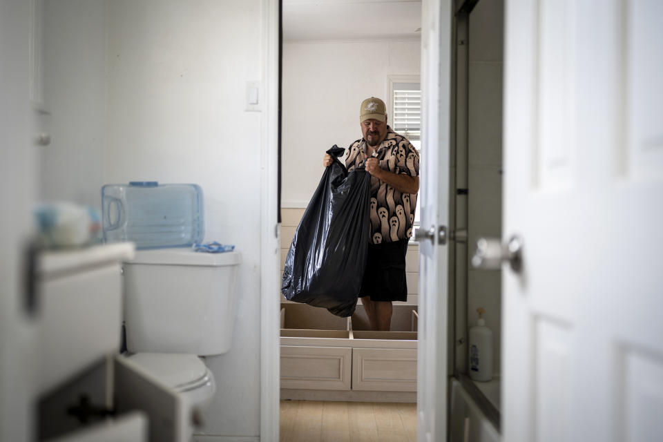 Michael Yost in the bedroom of the damaged home he was renting in Fort Myers Beach, Fla.  (Thomas Simonetti for NBC News)