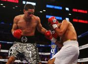 NEW YORK, NY - OCTOBER 20: Danny Garcia and Erik Morales exchange punches during their WBC/WBA junior welterweight title at the Barclays Center on October 20, 2012 in the Brooklyn Borough of New York City. (Photo by Al Bello/Getty Images for Golden Boy Promotions)