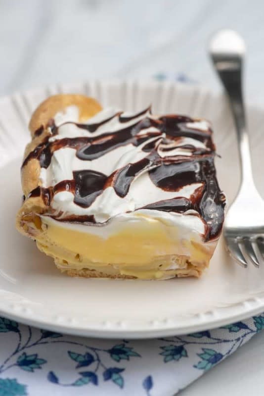 <p><strong>Easy Cream Puff Dessert</strong><br> Get the recipe <a href="https://www.fromvalerieskitchen.com/easy-cream-puff-dessert/" rel="nofollow noopener" target="_blank" data-ylk="slk:here;elm:context_link;itc:0;sec:content-canvas" class="link "><em><strong>here</strong></em></a></p>