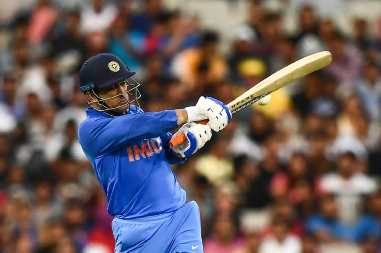 Unflappable Mahendra Singh Dhoni hit his third half-century of the three-game series against Australia