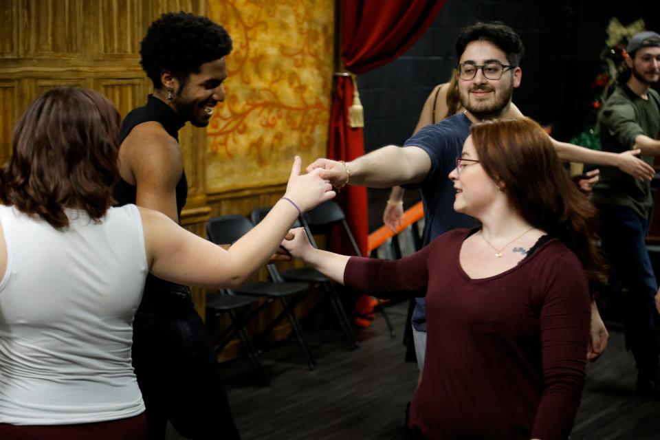 From left, Joshua Murray, Karam Alkhati, and Jacey Nichole on Nov. 28 rehearse a Regency Era dance for Oklahoma Shakespeare in the Park's production of "Jane Austen's Christmas Cracker" in Oklahoma City.