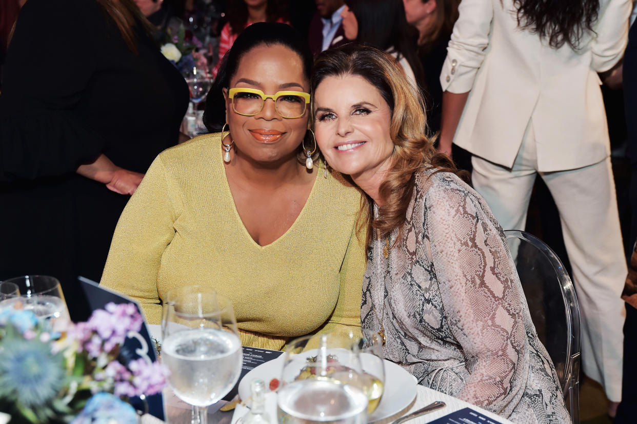 Oprah Winfrey poses with longtime friend Maria Shriver. (Stefanie Keenan/Getty Images for the Hollywood Reporter)