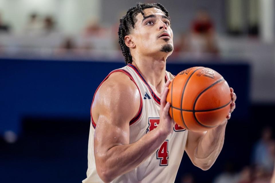 Bryan Greenlee takes aim for some of his 21 team-high points as FAU ended the regular season Saturday against Memphis in Boca Raton. Vlad Goldin also had 21 for the Owls.