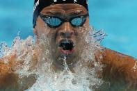 Michael Andrew participates in the Men's 100 Breaststroke during wave 2 of the U.S. Olympic Swim Trials on Monday, June 14, 2021, in Omaha, Neb. (AP Photo/Charlie Neibergall)