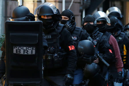 Members of French special police forces of Research and Intervention Brigade (BRI) leave following a police operation the day after a shooting in Strasbourg, France, December 12, 2018. REUTERS/Vincent Kessler