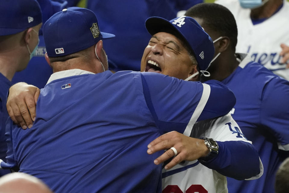 Los Angeles Dodgers manager Dave Roberts celebrates after defeating the Tampa Bay Rays 3-1 to win the baseball World Series in Game 6 Tuesday, Oct. 27, 2020, in Arlington, Texas. (AP Photo/Eric Gay)