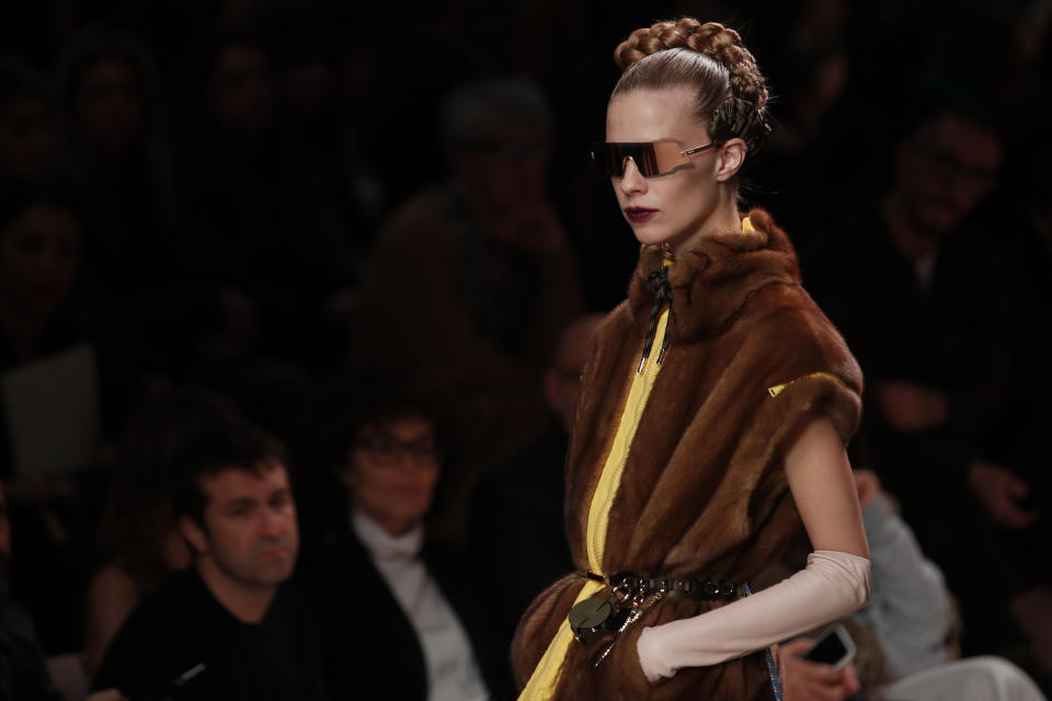 A model wears a creation as part of the Fendi Fall/Winter 2020 collection, presented in Milan, Italy, Thursday, Feb. 20, 2020. (AP Photo/Antonio Calanni)