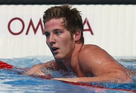 James Feigen of the U.S. reacts after winning the men's 100m freestyle semi-final during the World Swimming Championships at the Sant Jordi arena in Barcelona July 31, 2013. REUTERS/Albert Gea