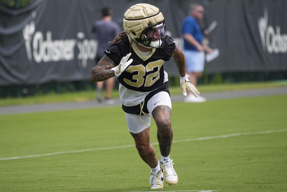 New Orleans Saints safety Tyrann Mathieu (32) runs through drills during the team's NFL football minicamp in Metairie, La., Wednesday, June 12, 2024. (AP Photo/Gerald Herbert)