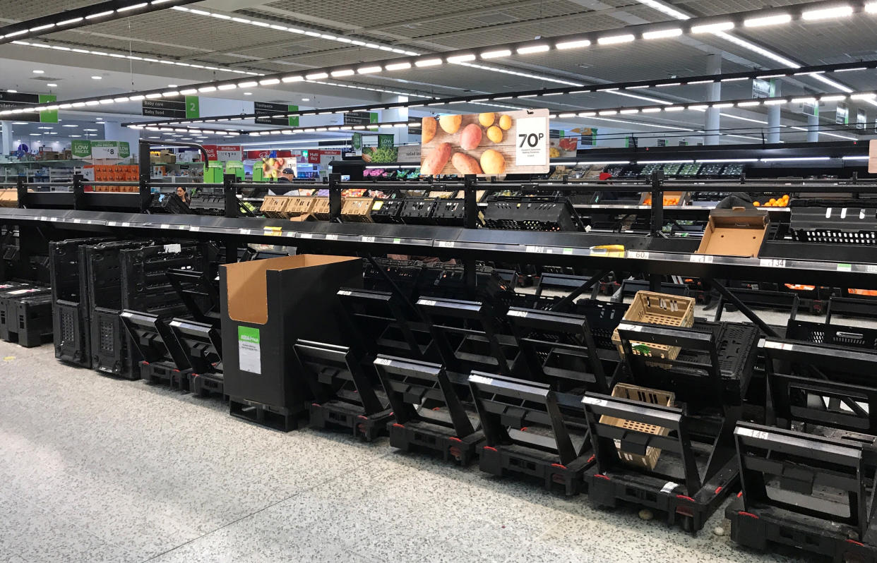 The empty fruit and vegetable section at an Asda store in Watford. (Reuters) 