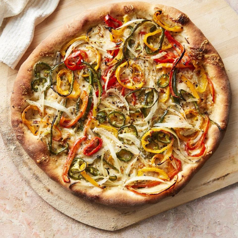 <p>Completely vegetarian (and can even be vegan if you skip the cheese), but that doesn't mean it's lacking in flavor at all. The hot pepper mixed with the onion and jalapeño is one of the best combos ever. </p><p><em><strong><a href="https://www.womansday.com/food-recipes/a32676355/hot-pepper-and-onion-pizza-recipe/" rel="nofollow noopener" target="_blank" data-ylk="slk:Get the Hot Pepper and Onion Pizza recipe.;elm:context_link;itc:0;sec:content-canvas" class="link ">Get the Hot Pepper and Onion Pizza recipe. </a></strong></em></p>