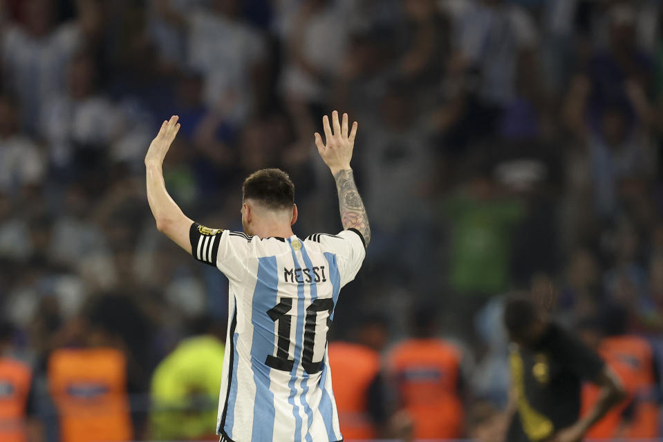 Argentina's Lionel Messi celebrates scoring the opening goal during an international friendly soccer match against Curacao in Santiago del Estero, Argentina, Tuesday, March 28, 2023. Messi scored his 100th goal with the national soccer team.