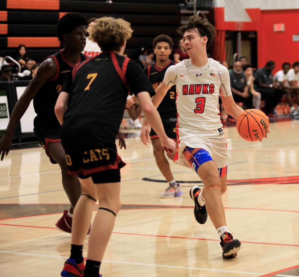 Spruce Creek’s Tyler McKnight (3) dribbles the ball down the court against Bridge to Independence during the Execute to Impact MLK Showcase at Spruce Creek High School on Monday, Jan. 15, 2024.