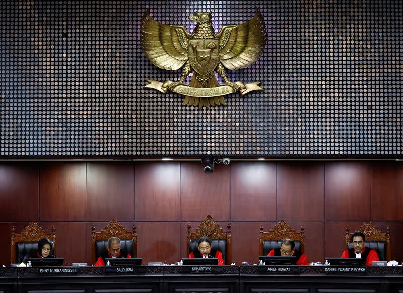 Verdict on two challenges to the outcome of February's presidential election, in Jakarta