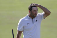 Jon Rahm, of Spain, reacts on the 18th green during the third round of the Memorial golf tournament, Saturday, July 18, 2020, in Dublin, Ohio. (AP Photo/Darron Cummings)