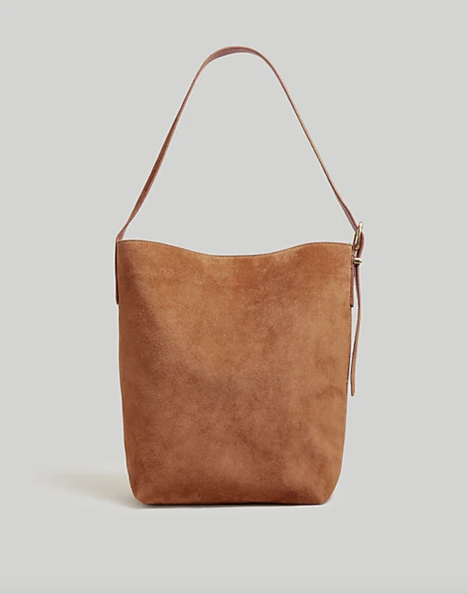 <p><a href="https://go.redirectingat.com?id=74968X1596630&url=https%3A%2F%2Fwww.madewell.com%2Fthe-essential-bucket-tote-in-suede-99107247249.html&sref=https%3A%2F%2Fwww.townandcountrymag.com%2Fstyle%2Ffashion-trends%2Fg60334913%2Fbest-bucket-bags%2F" rel="nofollow noopener" target="_blank" data-ylk="slk:Shop Now;elm:context_link;itc:0;sec:content-canvas" class="link ">Shop Now</a></p><p>The Essential Bucket Tote</p><p>madewell.com</p><p>$178.00</p>