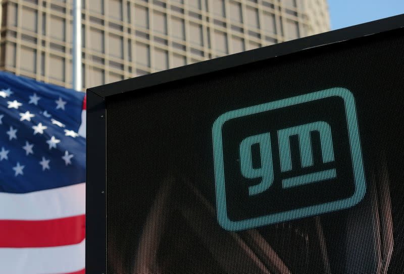 FILE PHOTO: Logo of GM atop the company headquarters