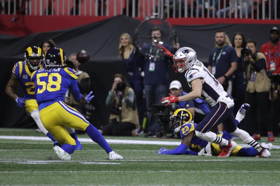 <p>Los Angeles Rams’ Cory Littleton (58) intercepts a pass intended for New England Patriots’ Chris Hogan, right, during the first half of the NFL Super Bowl 53 football game Sunday, Feb. 3, 2019, in Atlanta. (AP Photo/Patrick Semansky) </p>