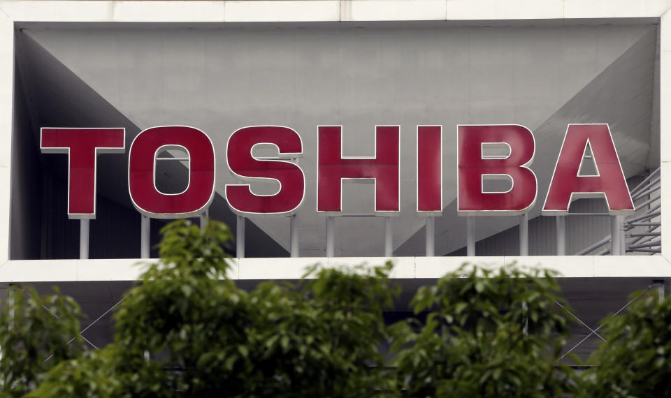 FILE - This May 26, 2017, file photo shows the company logo of Toshiba Corp. displayed in front of its headquarters in Tokyo. Battered Japanese nuclear and electronics giant Toshiba Corp. faced off with shareholders Friday, June 25, 2021, seeking to shake off serious questions about governance at the once revered brand. (AP Photo/Koji Sasahara, File)