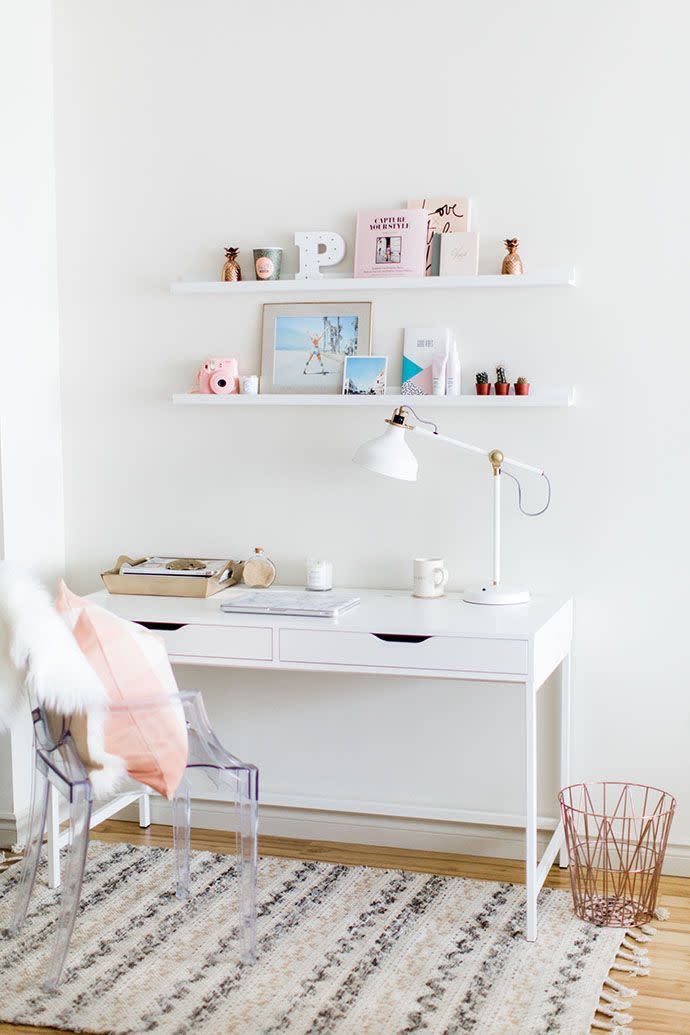 32) A Lucite Chair Adds Glam to an All-White Desk Area