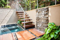 <p> Definitely a job for the professionals &#x2013; an outdoor cantilevered staircase makes a big style statement.&#xA0; </p> <p> Bold and undeniably modern, it consists of a series of chunky, slab-style treads jutting out from a side wall. With barely-there railings providing support on the opposite side, the effect can be breathtaking.&#xA0; </p> <p> Besides any lack of obvious support, the charm and impact also lie in the mix of materials used and the surfaces that surround the steps. Crisply rendered walls, panels of jagged stone, and rough brick cladding all work well with this style. Add in recessed lighting, lush planting, and perhaps a soothing water feature nearby as chic finishing touches to the scene. </p>