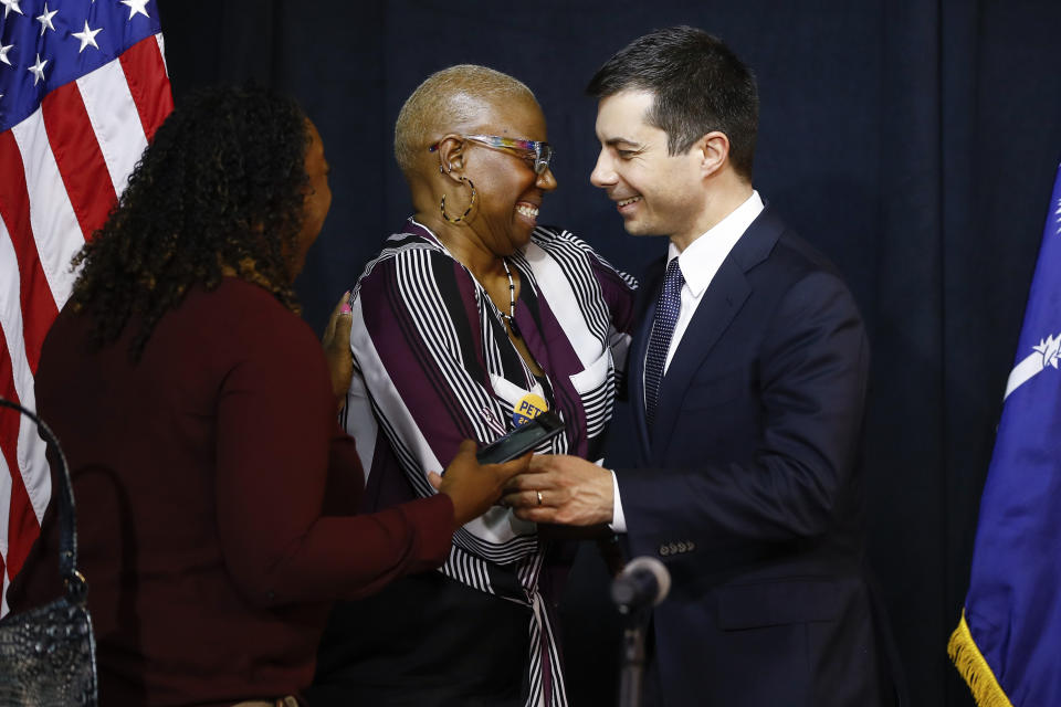 Democratic presidential candidate former South Bend, Ind., Mayor Pete Buttigieg meets with attendees after a roundtable discussing health equity, Thursday, Feb. 27, 2020, at the Nicholtown Missionary Baptist Church in Greenville, S.C. (AP Photo/Matt Rourke)