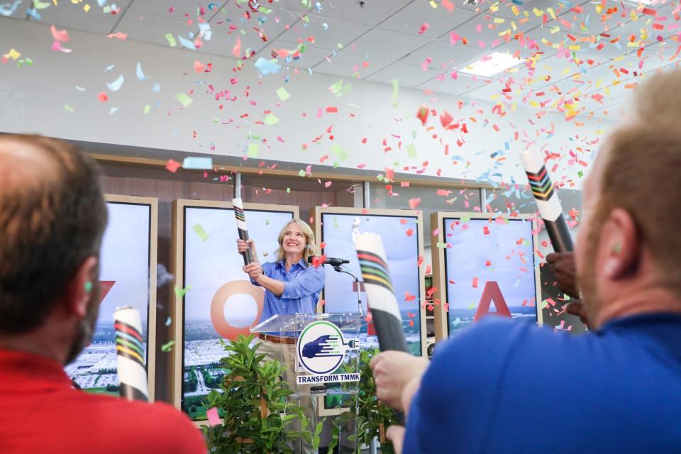 Toyota Kentucky President Susan Elkington celebrates with employees after announcing the facility will assemble Toyota’s first Battery Electric Vehicle in the U.S.