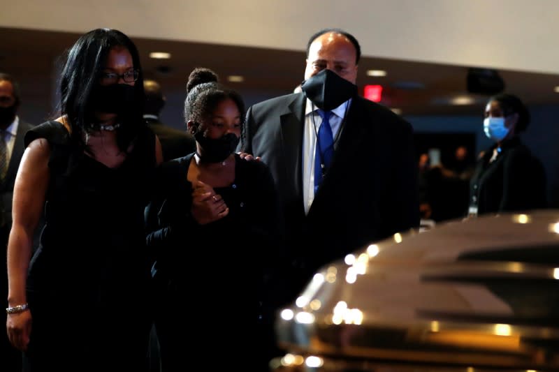 Martin Luther King III are seen during a memorial service for George Floyd following his death in Minneapolis police custody, in Minneapolis