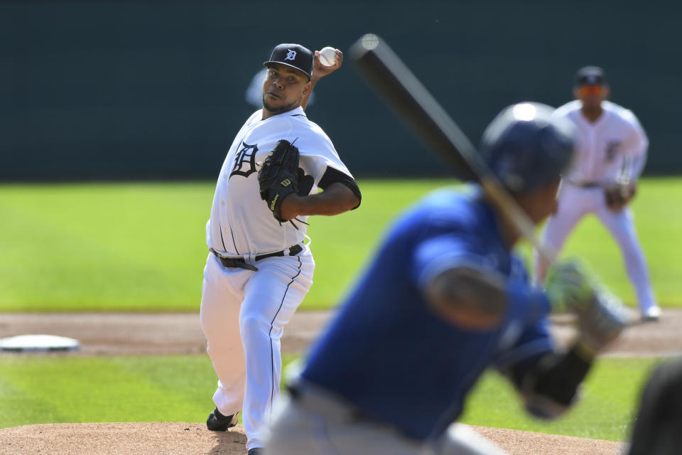 Detroit Tigers starting pitcher Wily Peralta, left, throws to Kansas City Royals designated hitter Salvador Perez in the first inning of a baseball game, Sunday, Sept. 26, 2021, in Detroit. (AP Photo/Jose Juarez)