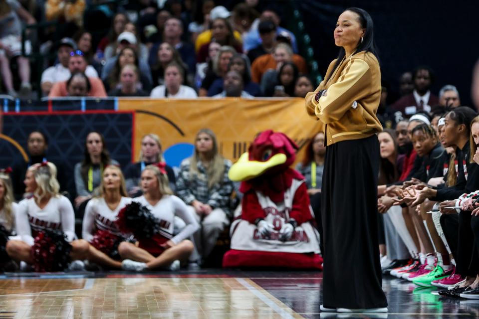 Mar 31, 2023; Dallas, TX, USA; South Carolina Gamecocks head coach Dawn Staley stands on the sideline in the game against the Iowa Hawkeyes in the first half in semifinals of the women's Final Four of the 2023 NCAA Tournament at American Airlines Center. Mandatory Credit: Kevin Jairaj-USA TODAY Sports