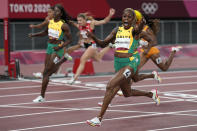 Elaine Thompson-Herah of Jamaica, celebrates as she wins the women's 100-meters final at the 2020 Summer Olympics, Saturday, July 31, 2021, in Tokyo. (AP Photo/David J. Phillip)