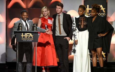 The cast and Dee Rees accepting the breakout ensemble award at the Hollywood Film Awards on Sunday - Credit:  Chris Pizzello/Invision