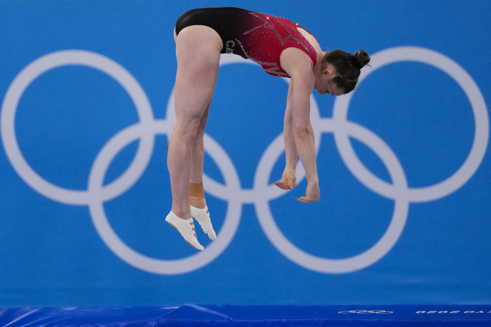 Rosannagh Maclennan, of Canada, competes in the women's trampoline gymnastics qualifiers at the 2020 Summer Olympics, Friday, July 30, 2021, in Tokyo. (AP Photo/Ashley Landis)