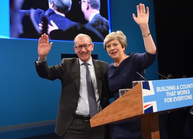 Philip and Theresa May wave to delegates after the PM's conference speech