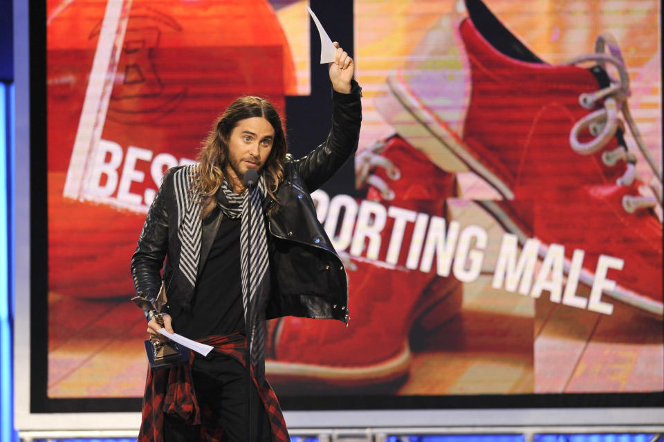 Jared Leto accepts the award for best supporting male on stage at the 2014 Film Independent Spirit Awards, on Saturday, March 1, 2014, in Santa Monica, Calif. (Photo by Chris Pizzello/Invision/AP)