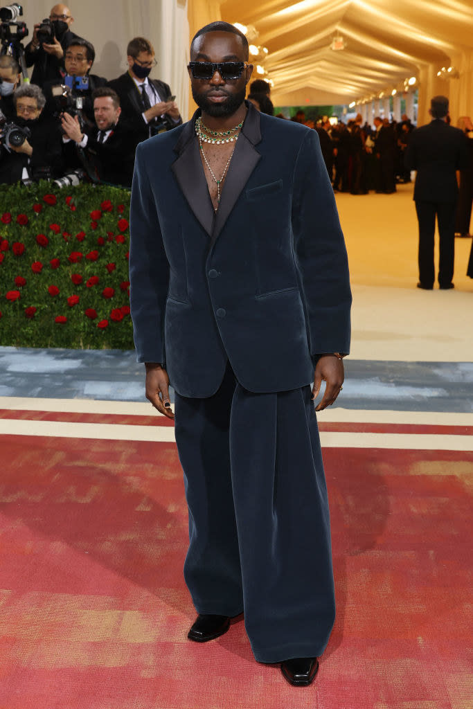 Paapa Essiedu in a wide legged velvet tux