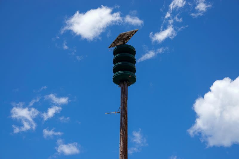 FILE PHOTO: A warning siren is pictured in the fire ravaged town of Lahaina