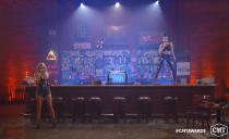 In this video image provided by CMT, Kelsea Ballerini, left, and Halsey perform “The Other Girl” during the Country Music Television awards airing on Wednesday, Oct. 21, 2020. (CMT via AP)