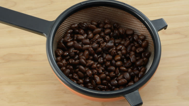 black beans in strainer