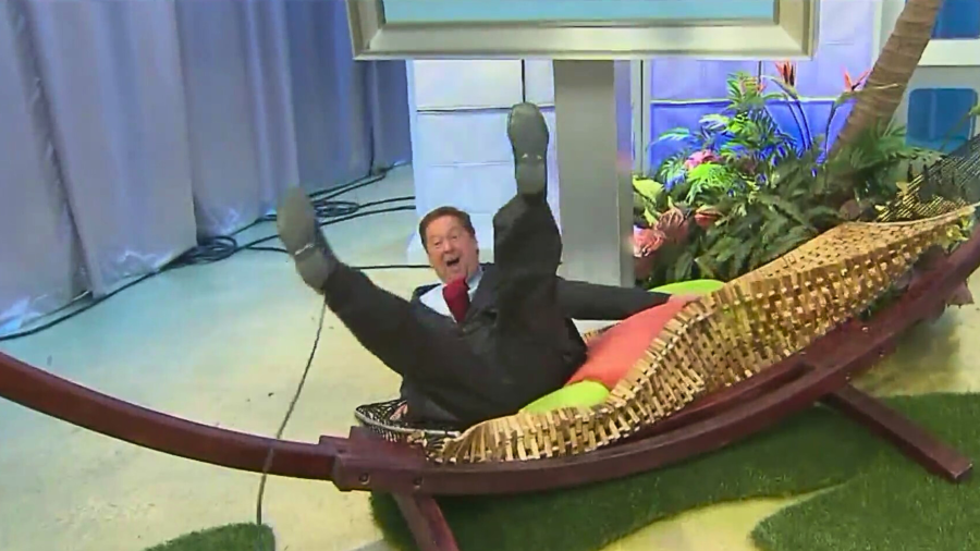 Sam Rubin falls while trying to get into a hammock on the KTLA 5 Morning News. (KTLA)