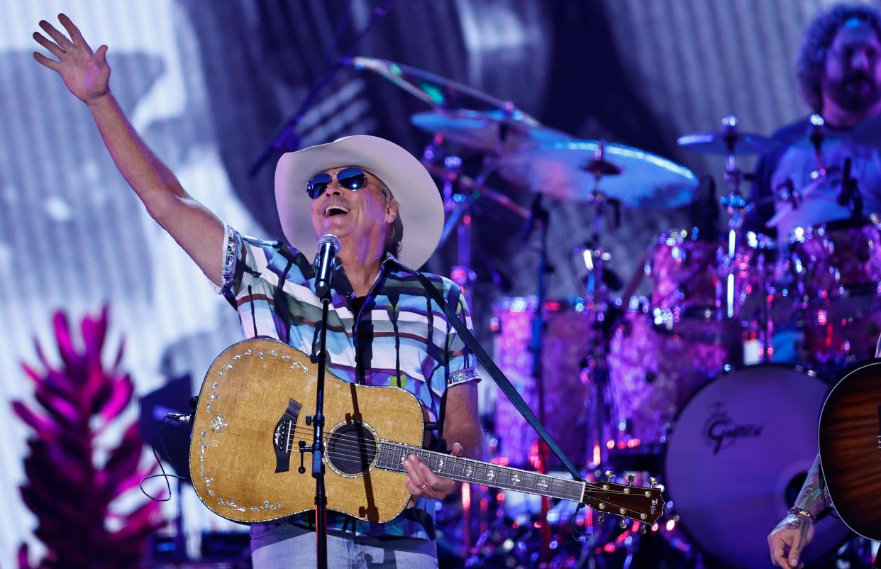 FILE - Alan Jackson performs during the 57th Annual Country Music Association Awards in Nashville, Tenn., on Nov. 8. Jackson calls Newnan, Georgia his hometown.