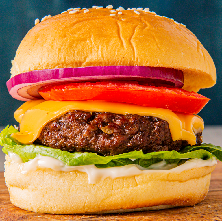 <p>With the quick cook time, these <a href="https://www.delish.com/uk/cooking/recipes/g30993382/best-burger-recipes/" rel="nofollow noopener" target="_blank" data-ylk="slk:burgers;elm:context_link;itc:0;sec:content-canvas" class="link ">burgers</a> stay perfectly juicy and basically beg for a melty slice of cheese. Load it up with your favourite toppings and feel like the burger master you are - without all the smoke in your face. </p><p>Get the <a href="https://www.delish.com/uk/cooking/recipes/a32283836/air-fryer-hamburgers-recipe/" rel="nofollow noopener" target="_blank" data-ylk="slk:Air Fryer Cheeseburgers;elm:context_link;itc:0;sec:content-canvas" class="link ">Air Fryer Cheeseburgers</a> recipe.</p>