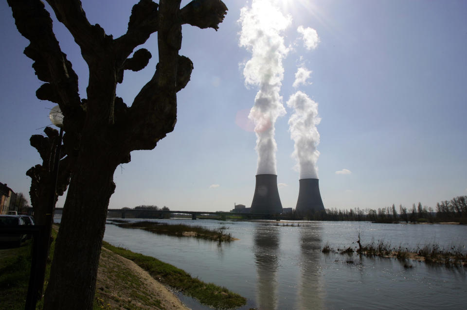 FILE - This March 27, 2007 file photo shows the Belleville-sur-Loire's nuclear plant, across the Loire river, central France. France's nuclear safety authority gave its green light on Thursday to extend the lifetime of the country's 32 oldest nuclear reactors for an additional decade, potentially allowing them to be operational for as long as 50 years. (AP Photo/Francois Mori, File)