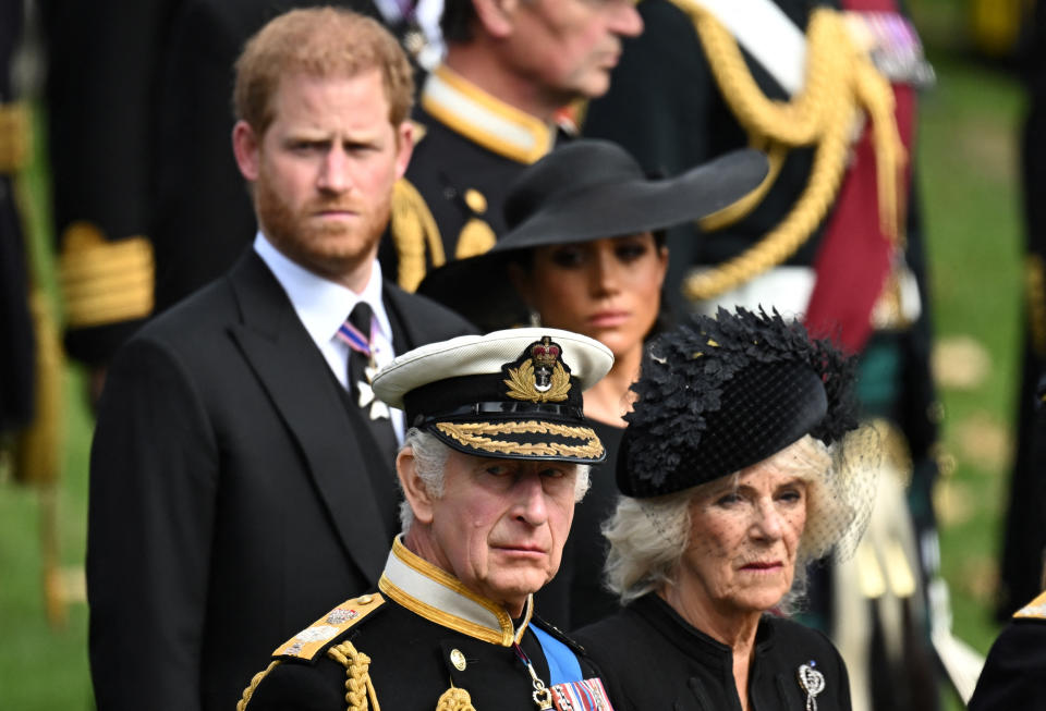 Britain's King Charles, Queen Camilla, Prince Harry, Duke of Sussex, and Meghan, Duchess of Sussex, attend the state funeral and burial of Britain's Queen Elizabeth, in London, Britain, September 19, 2022 REUTERS/Toby Melville