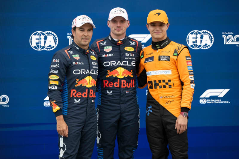 (L-R)Oracle Red Bull Racing's Sergio Perez, Oracle Red Bull Racing's Max Verstappen and McLaren's Lando Norris pose for pictures  in Parc Femme after landing top 3 positions on Qualifying day of the 2024 Formula 1 Japanese Grand Prix. Taidgh Barron/ZUMA Press Wire/dpa