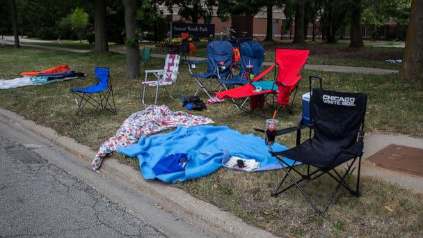 PHOTO: Chairs and blankets sit abandoned after a shooting at a Fourth of July parade on July 4, 2022 in Highland Park, Illinois. At least six people were killed, according to authorities. (Jim Vondruska/Getty Images)